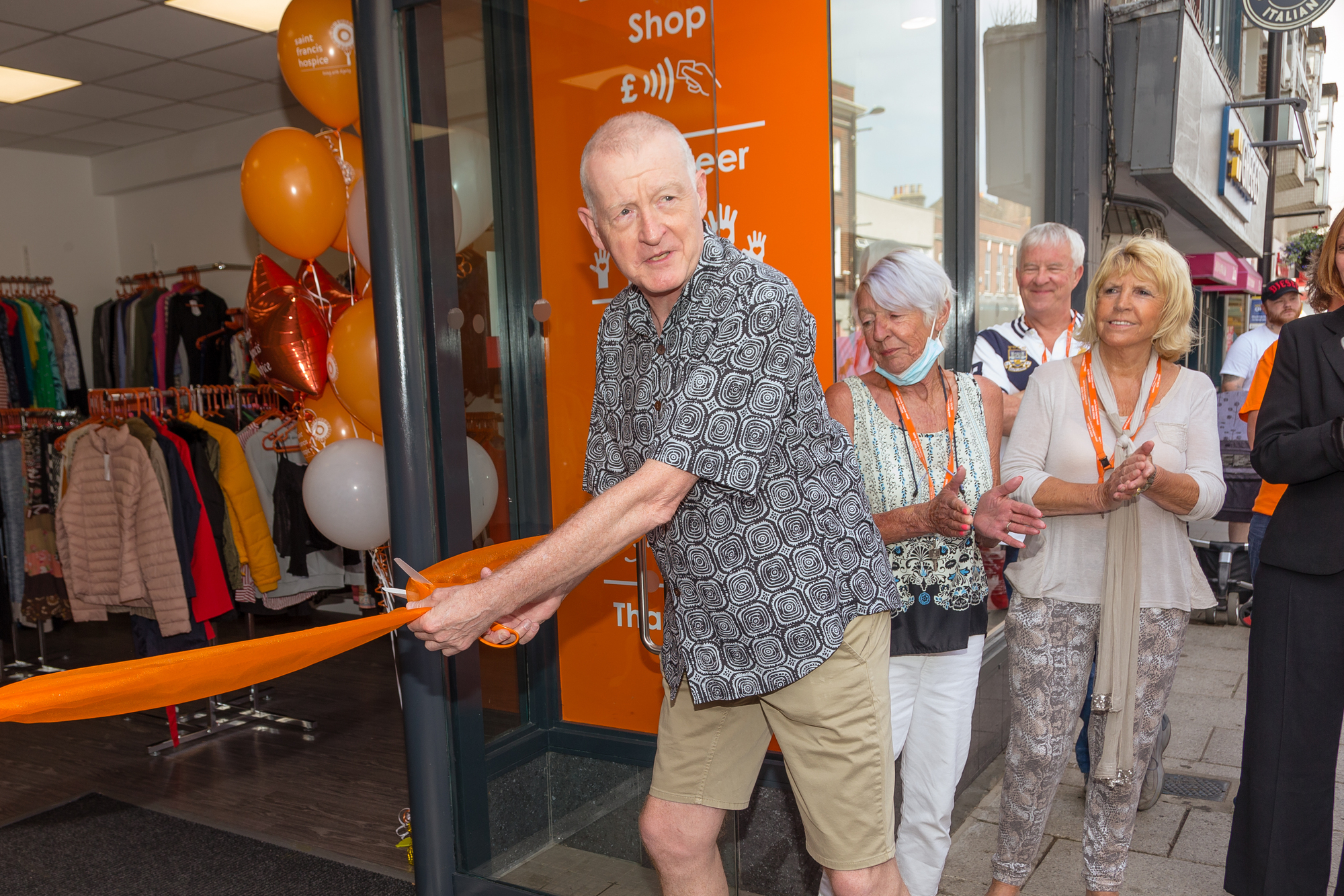 Steve Davis cuts the ribbon