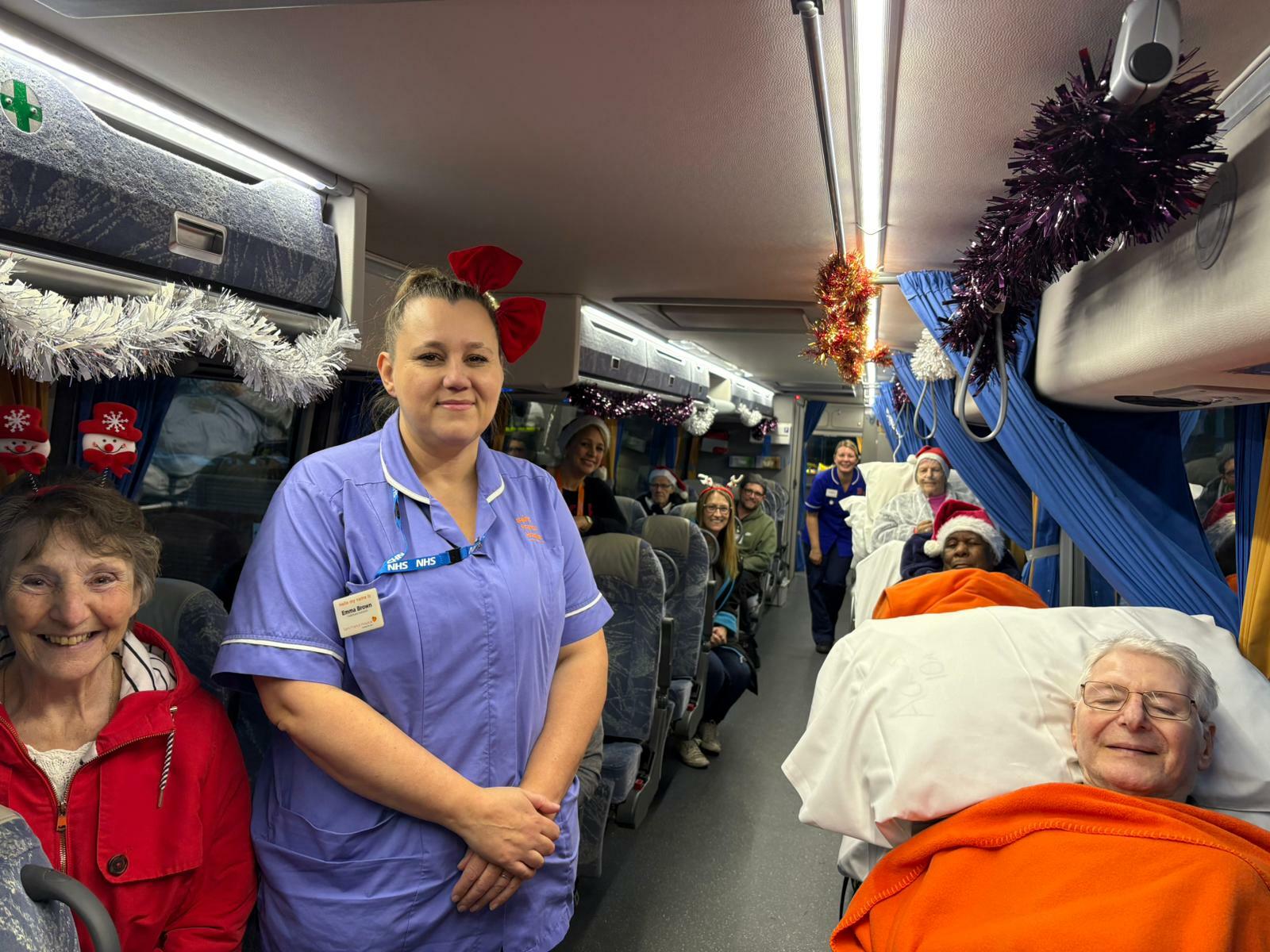 On the jumbulance, people under our care in their beds with care team and families