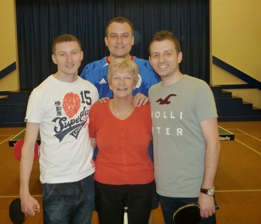 Jan with her three sons (cropped)