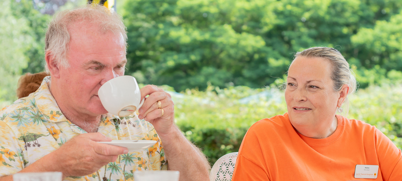 Enjoying a chat and a cuppa (cropped) (cropped)