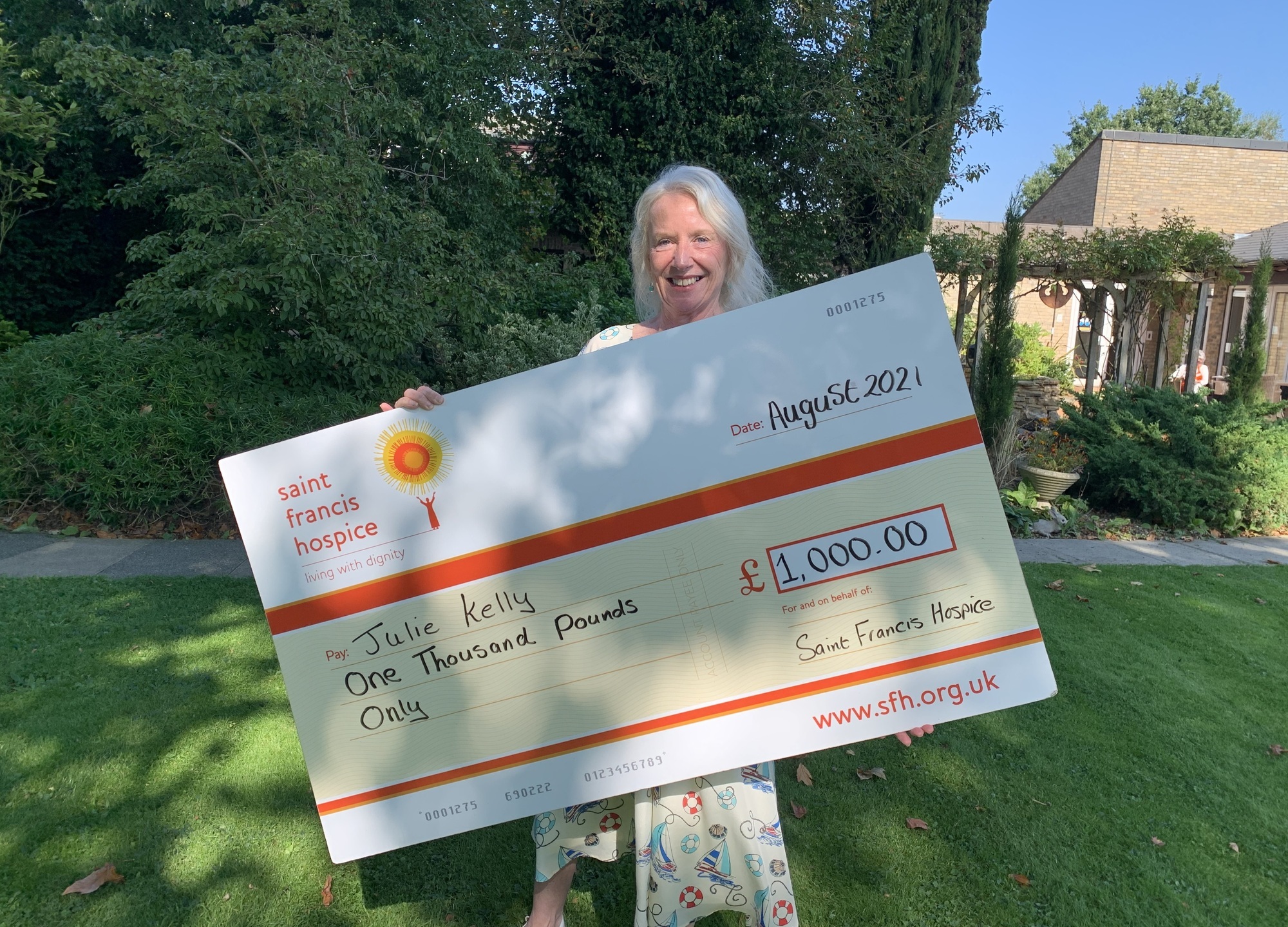 Julie Kelly with lottery cheque