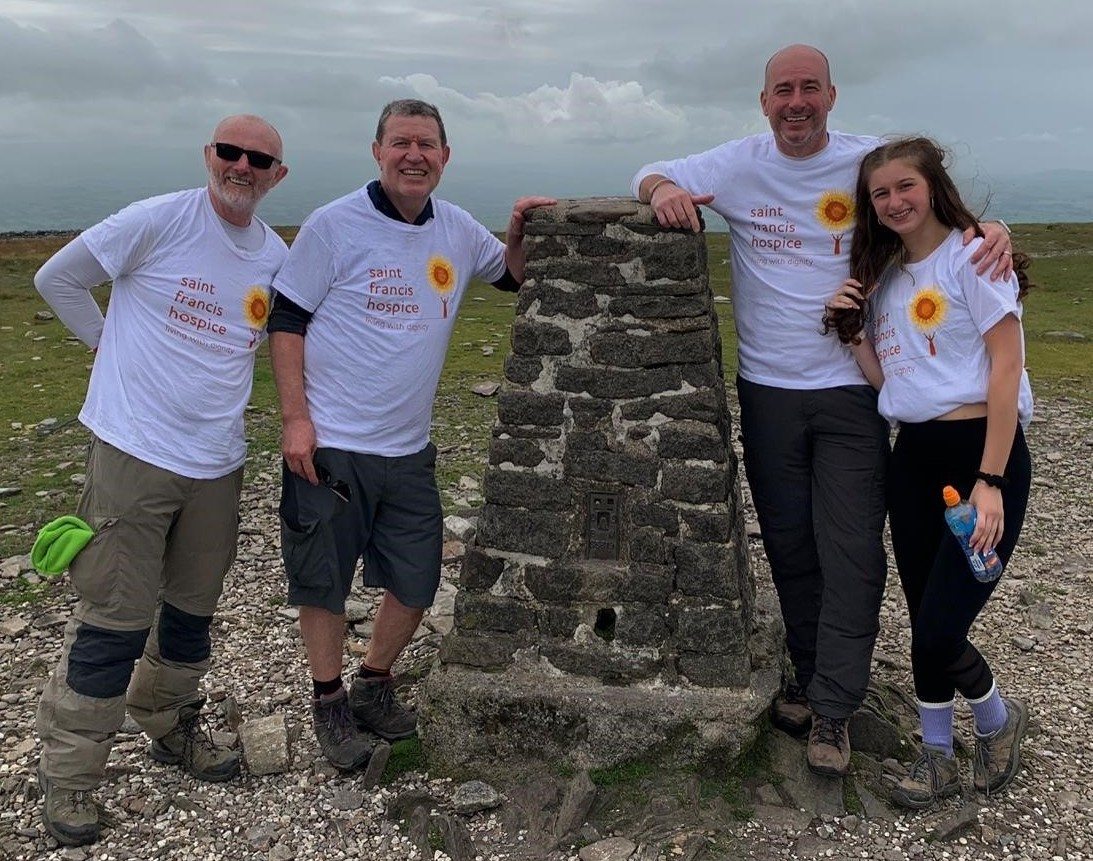 4 climbers at summit together (cropped) (cropped)