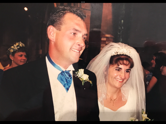 Mark and his wife Emily Taylor on their wedding day in 1999