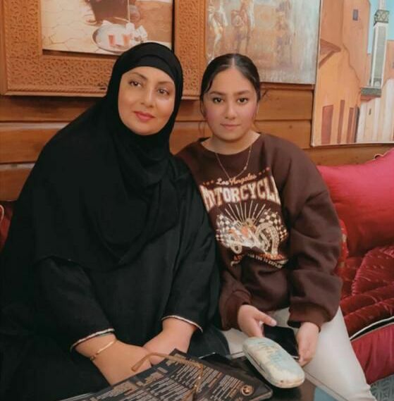Asia Malik with her daughter Amal (cropped)