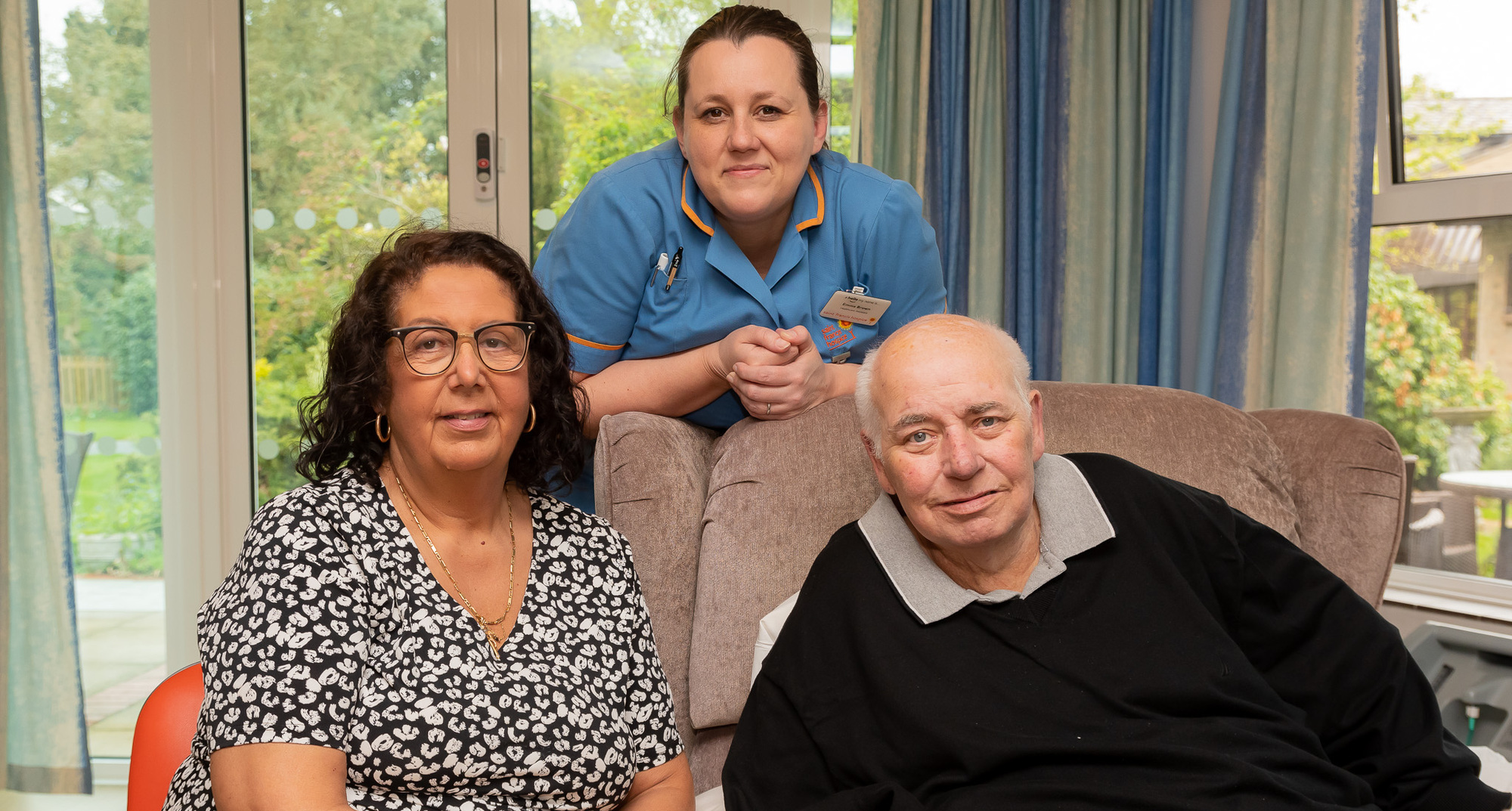 Mary Anne and Eddie on the ward with Emma Brown, healthcare assistant (1) (cropped)