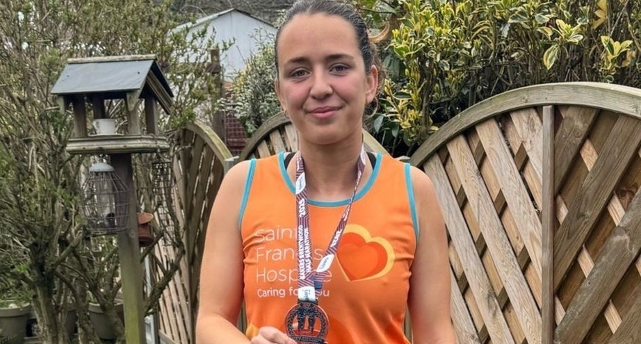 Erin with her Brentwood Half Marathon medal (cropped)