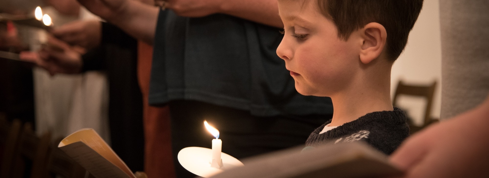 Brentwood - Boy with candle-min (cropped)