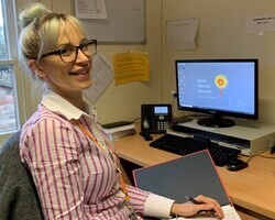 Katy Marling at her desk (cropped)