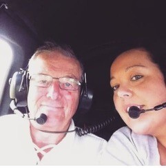 Laura Butler with her dad Denis Butler on a helicopter ride