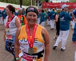 Julie Buckley with her medal (cropped)