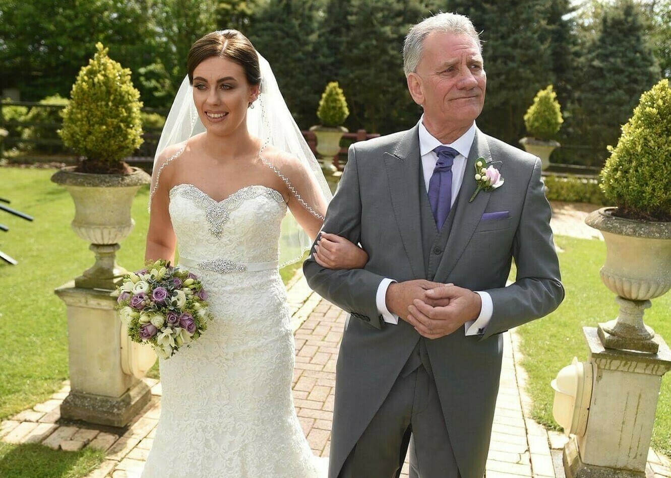 Mick Anderson and his daughter Katie May on her wedding day (cropped)